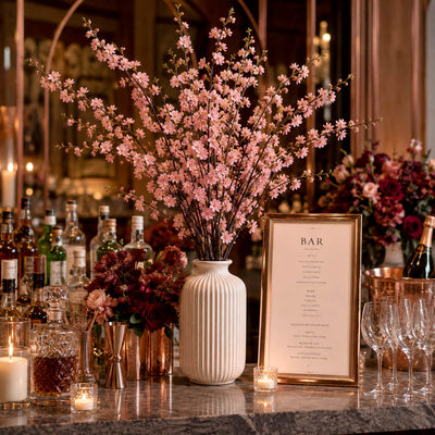 45" pink cherry blossom branches in a white vase on a bar setup - thumbnail number 5
