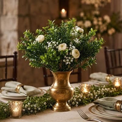 Green boxwood sprays with white flowers in a brass vase - thumbnail number 5