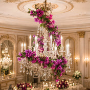 Bougainvillea garland wrapped around a large crystal chandelier - thumbnail number 4