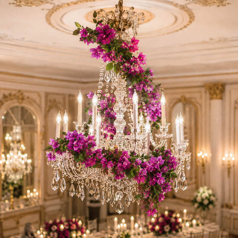 Bougainvillea garland wrapped around a large crystal chandelier - thumbnail number 4
