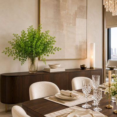 Artificial maidenhair fern in glass vase on a dark wood sideboard in dining room - thumbnail number 7