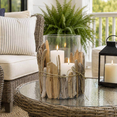 Glass candleholder wrapped with driftwood on an outdoor patio table - thumbnail number 7
