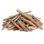 Pile of natural Lake Superior driftwood pieces on white background - thumbnail number 1