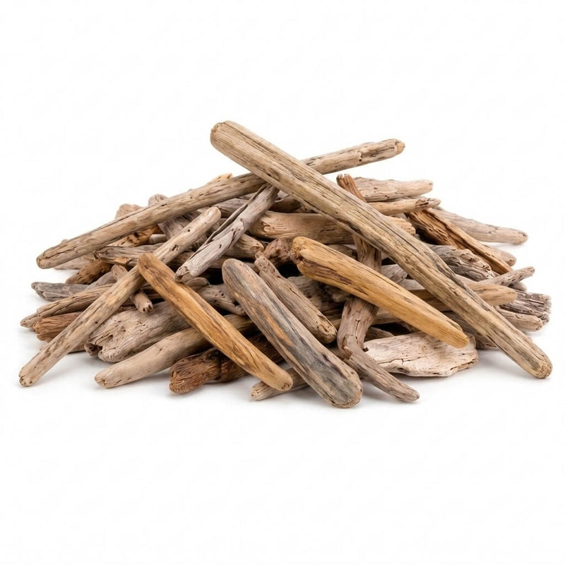 Pile of natural Lake Superior driftwood pieces on white background - thumbnail number 1