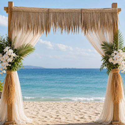Beach wedding arch decorated with artificial thatch fringe and tropical flowers - thumbnail number 2