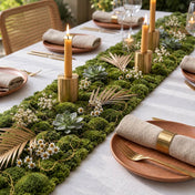 A faux moss table runner decorated with candles, succulents, and small white flowers - thumbnail number 2