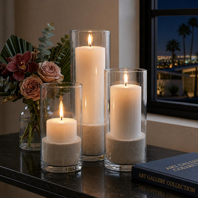 Lit candles in glass cylinders with natural white sand - thumbnail number 6