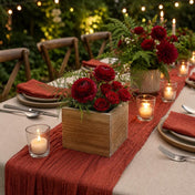 Handmade wooden berry box filled with deep red roses as a centerpiece on a table - thumbnail number 3