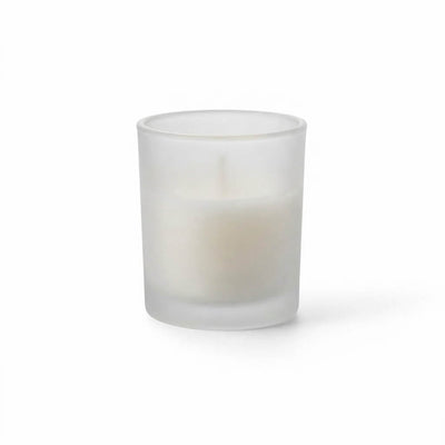 Frosted glass votive holder with white candle on white background - thumbnail number 2
