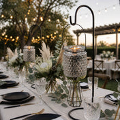 Candlelit outdoor reception table with hanging mercury holders and floral accents - thumbnail number 4