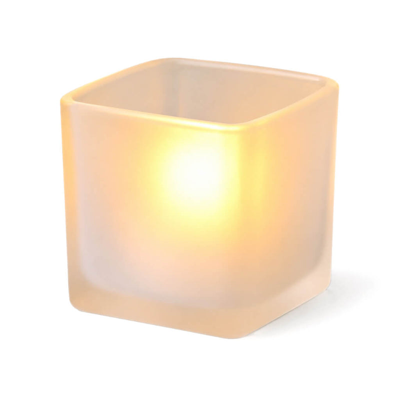 Square frosted votive candle holder glowing on white background - thumbnail number 2