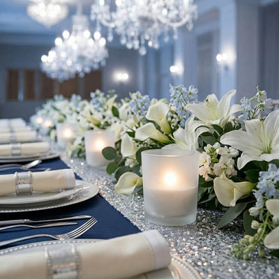 Formal tablescape with white florals, frosted candle holders, and sparkling runner - thumbnail number 4
