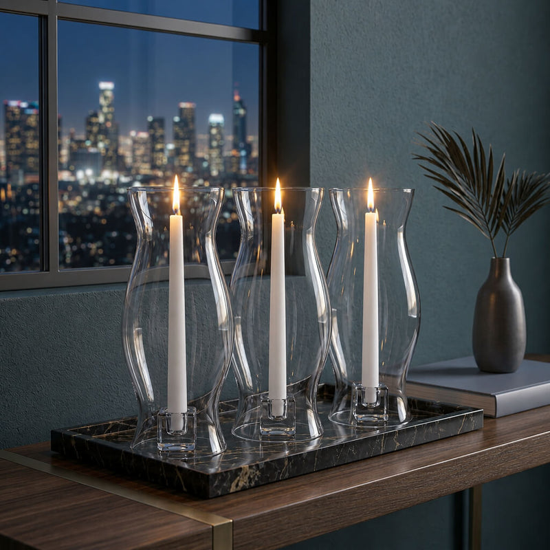Three Hurricane Pillar Candle Lamp displays on a black marble tray against a city night view - thumbnail number 8
