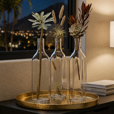 Glass square bottles with assorted dried botanicals on a gold tray - thumbnail number 6