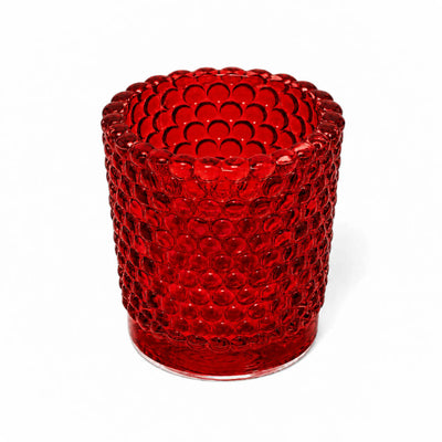 Red hobnail glass votive holder on white backdrop - thumbnail number 1