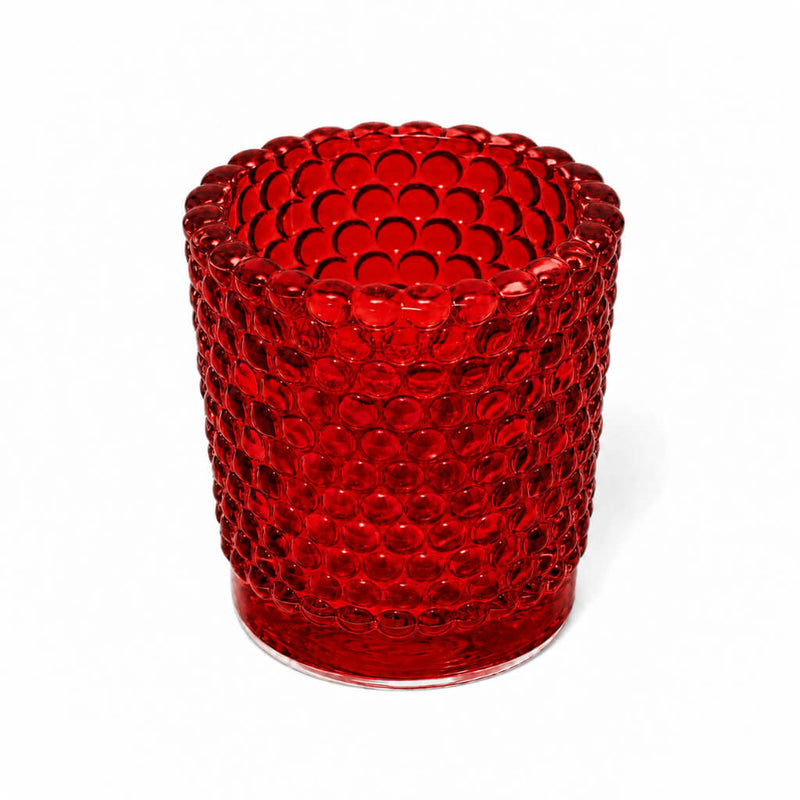 Red hobnail glass votive holder on white backdrop - thumbnail number 1
