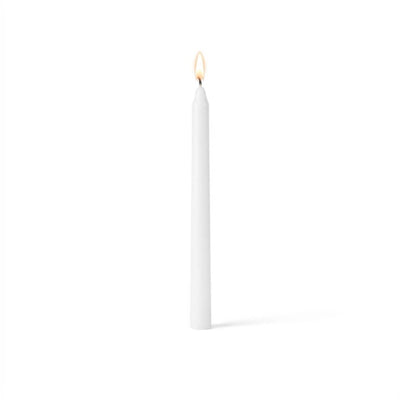 Single glowing white taper candle on clean white surface - thumbnail number 2