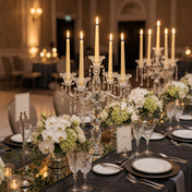 Romantic reception table with ivory candles and lush floral decor - thumbnail number 4