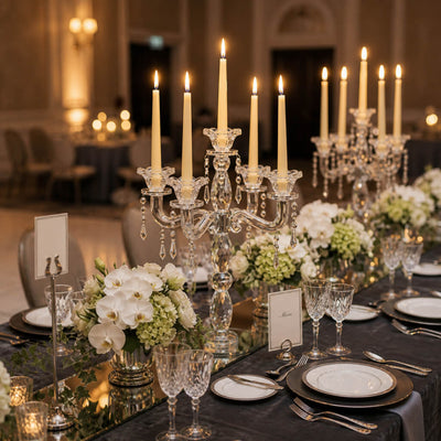 Romantic reception table with ivory candles and lush floral decor - thumbnail number 4