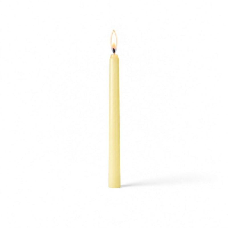 Ivory lit taper candle standing on white background - thumbnail number 2