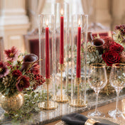 Red taper candles in glass hurricane holders with elegant floral centerpiece - thumbnail number 3