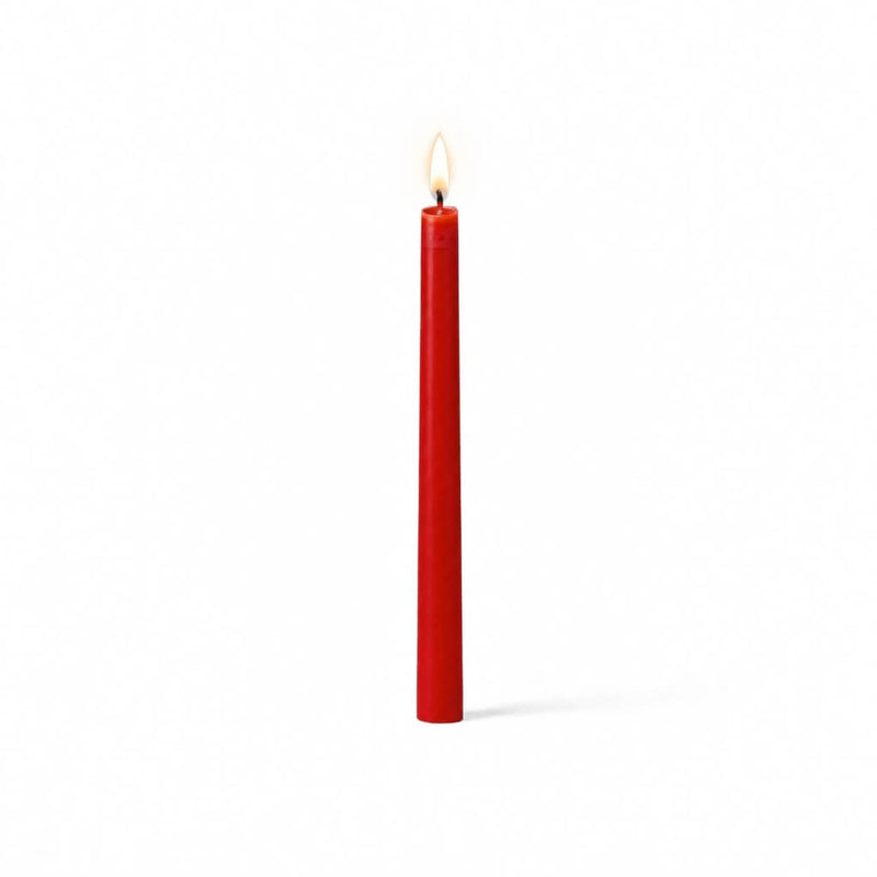 Red lit taper candle standing on white background - thumbnail number 2