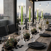 Green taper candles in crystal holders on elegant rooftop dining table - thumbnail number 4