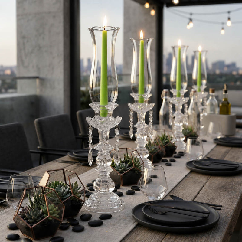 Green taper candles in crystal holders on elegant rooftop dining table - thumbnail number 4