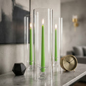 Modern decor with green taper candle inside tall glass holder - thumbnail number 6
