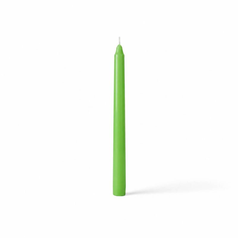 Unlit green taper candle isolated on white - thumbnail number 1