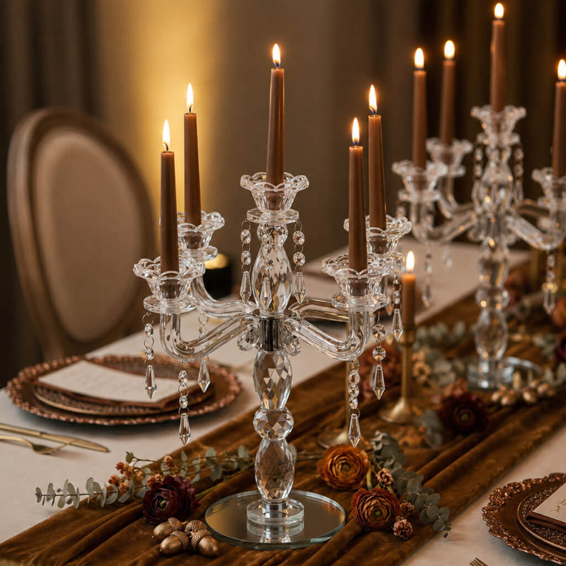Lit brown candles in crystal holders on a warm, formal tablescape - thumbnail number 3