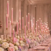 Romantic reception table with pink candles and pastel flower arrangements - thumbnail number 5