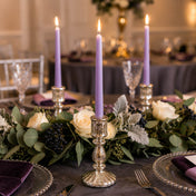 Lavender taper candles with greenery and white roses on dining table - thumbnail number 4