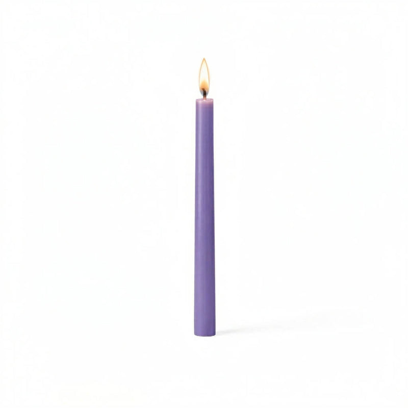 Single lavender taper candle glowing on white surface - thumbnail number 2