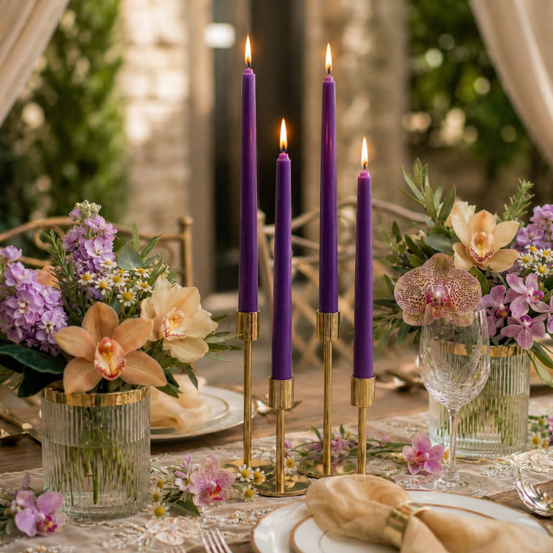 Lit purple taper candles with orchids and pastel floral table decor - thumbnail number 3