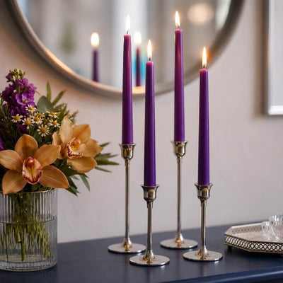 Purple taper candles and floral arrangement on modern tabletop decor - thumbnail number 6