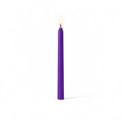 Purple lit taper candle standing on white background - thumbnail number 2