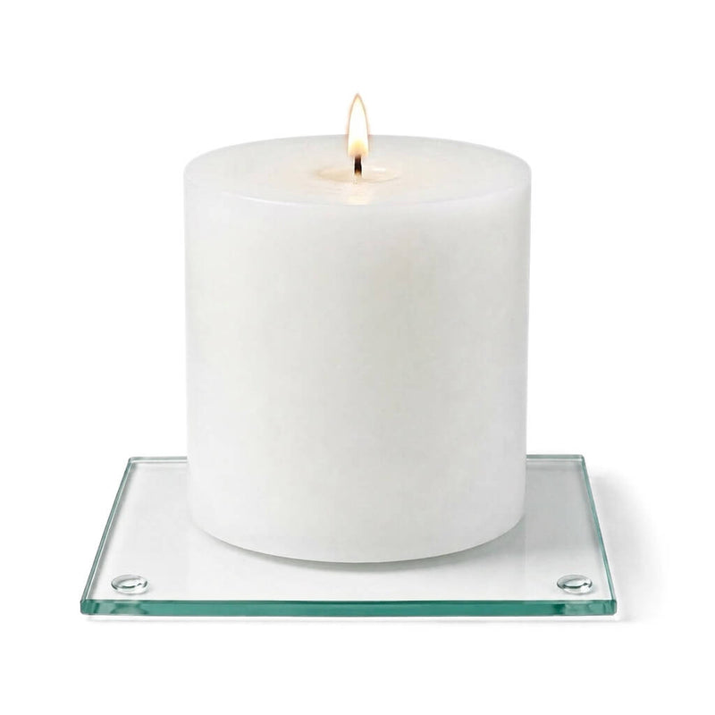 A clean product studio shot of a lit white candle on a clear glass Square Coaster 4" - thumbnail number 5