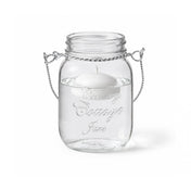 A Small Mason Jar with Handle and floating white candle - thumbnail number 2