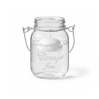 A Small Mason Jar with Handle and floating white candle - thumbnail number 2