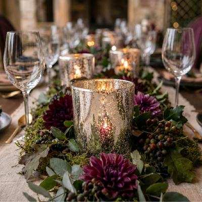 Mercury glass candle holders with purple flowers on an elegant rustic dinner table - thumbnail number 4