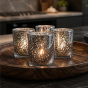 Set of glowing mercury glass candle holders on a wooden tray in a modern setting - thumbnail number 7
