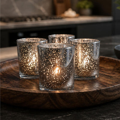 Set of glowing mercury glass candle holders on a wooden tray in a modern setting - thumbnail number 7