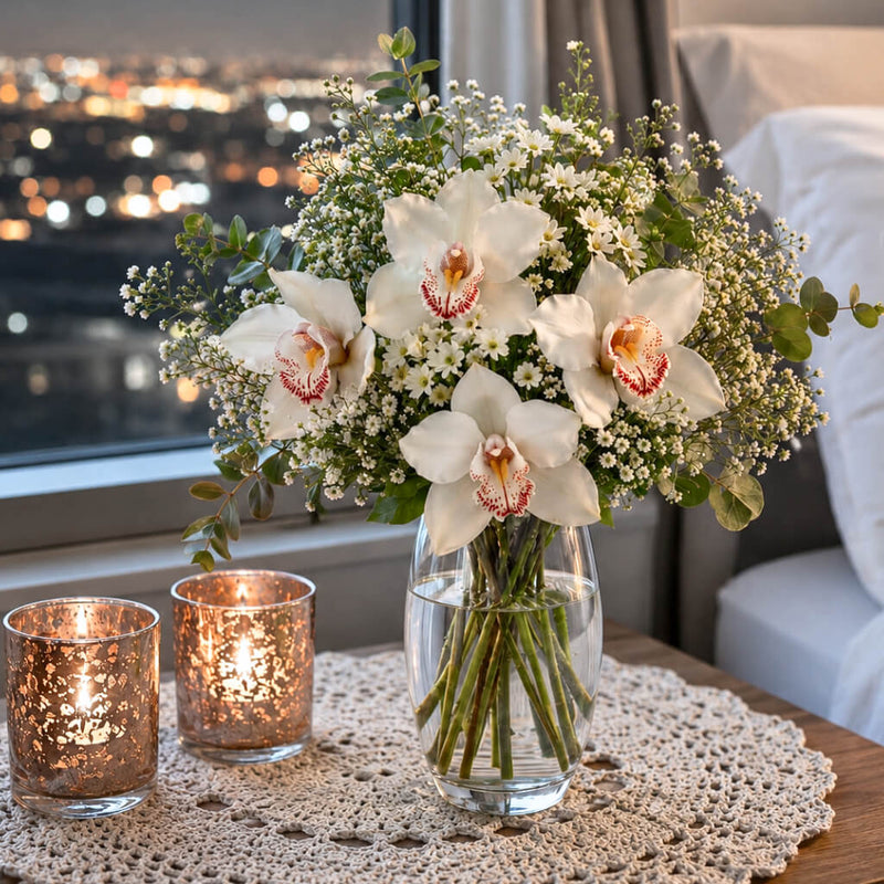 10" clear vase with white orchids and greenery - thumbnail number 10