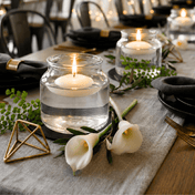 Floating white candles in the Etta Vase on a luxury event tablescape - thumbnail number 6