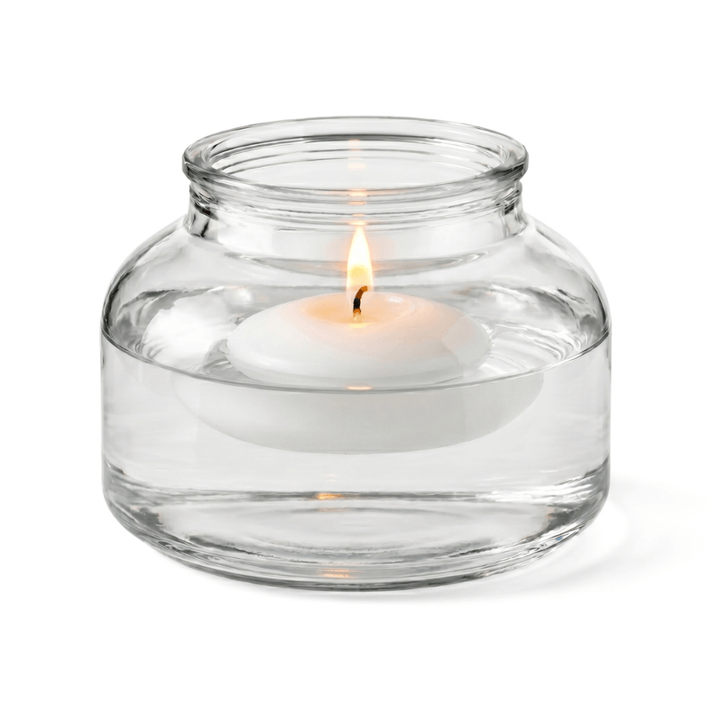 A floating lit white candle in the Etta Vase isolated on a solid white background - thumbnail number 3