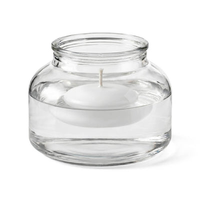 A unlit floating white candle in the Etta Vase isolated on a solid white background - thumbnail number 2