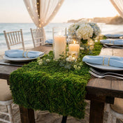 Preserved natural moss roll sheeting on a beach wedding table - thumbnail number 7