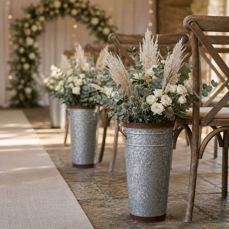 Two-tone French flower market bucket with pampas grass and roses along a wedding aisle - thumbnail number 9