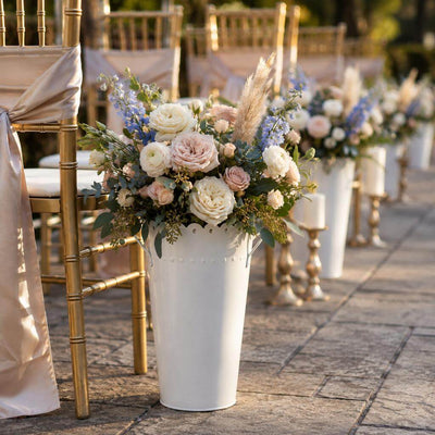 White scalloped flower market bucket with floral arrangement beside gold chairs - thumbnail number 2